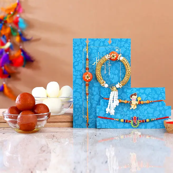 orange-lumba-rakhi-set-and-kids-devotional-rakhis-with-sweets-canada