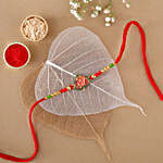 Sneh Exclusive Om Leaf Rakhi