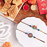Vibrant Ganesh and Om Rakhi Duo N Milk Cake Delight