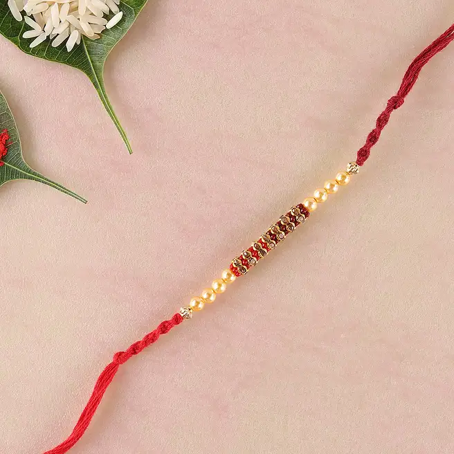 Sizzling Red Rakhi Thread germany | Gift Sizzling Red Rakhi Thread- FNP