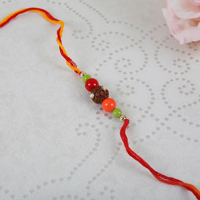 Buy/Send Exclusive Rudraksh Rakhi Online- FNP
