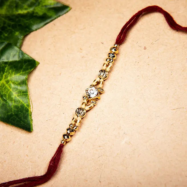 Square Rakhi Buy/Send Stunning Square Stone Rakhi Online- FNP