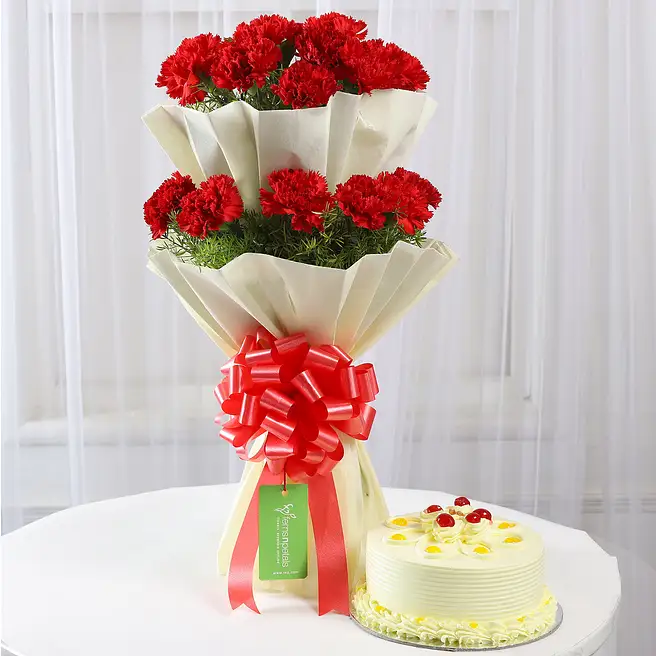 Buy/Send Two Layer Red Carnations With Butterscotch Cake Online- FNP