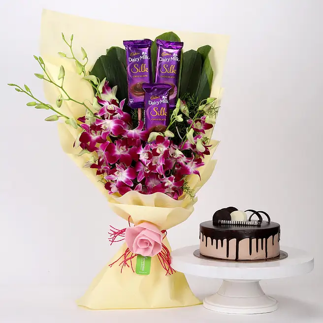 Buy/Send Dairy Milk & Orchids With Chocolate Cake Online- FNP