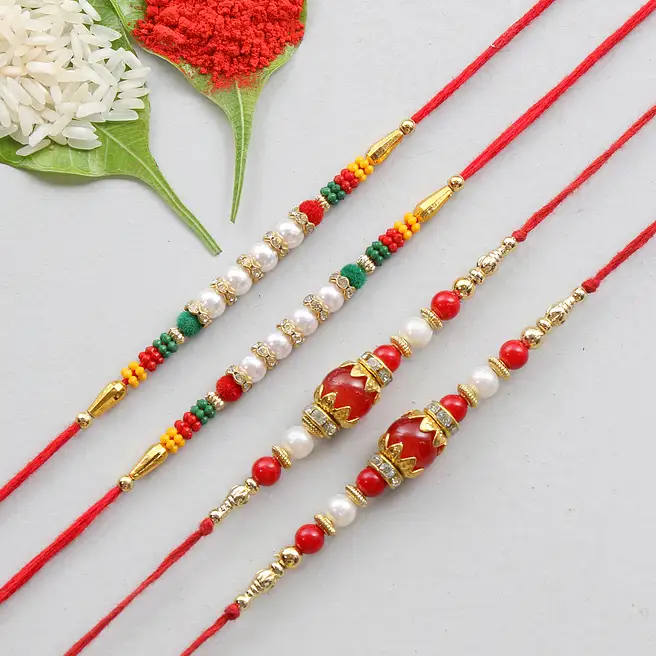 Buy/Send Set of Four Fancy Designer Rakhis Online- FNP