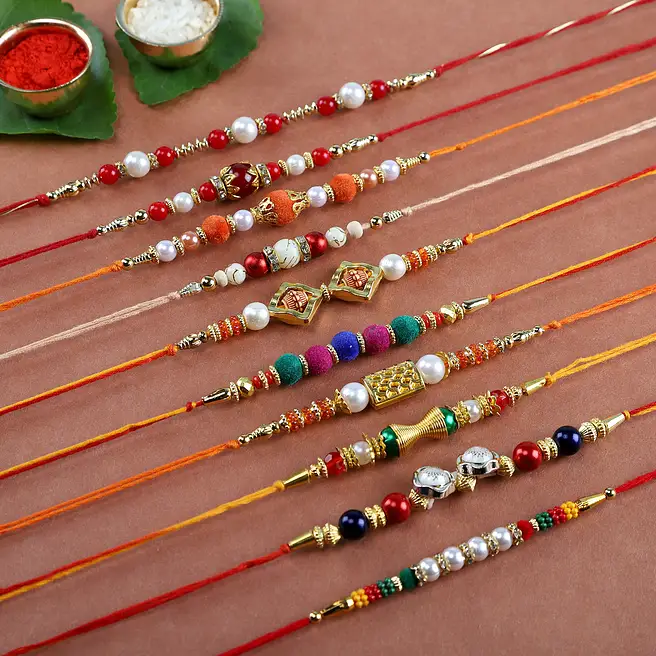 Buy/Send Complete Fancy Set of 10 Rakhis Online- FNP