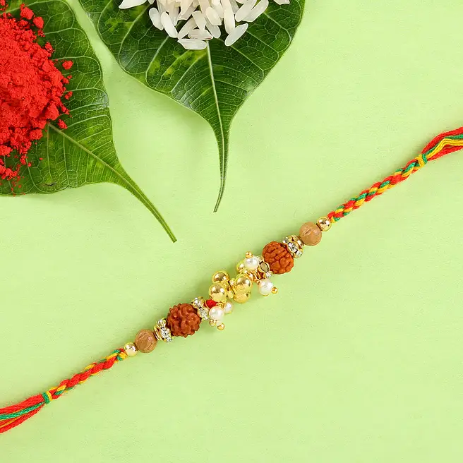 Buy/Send Pearl & Rudraksh Rakhi Online- FNP