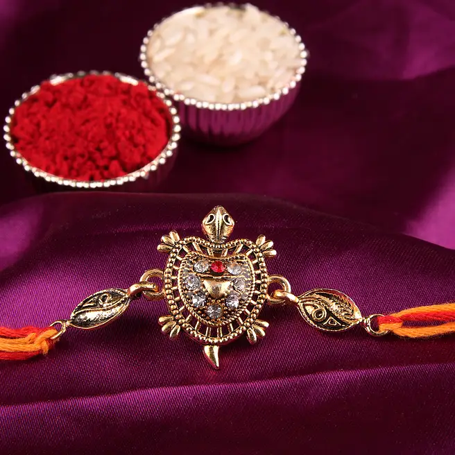 Turtle Raki Buy/Send Diamond Studded Turtle Rakhi Online- FNP