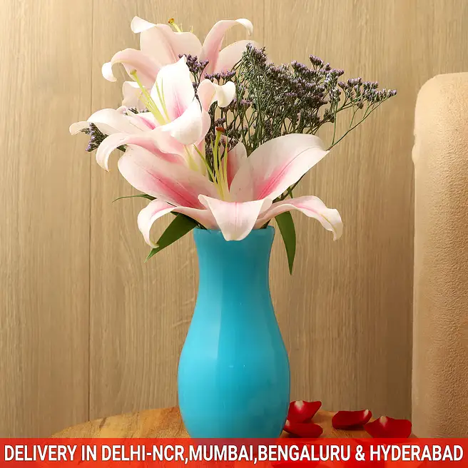 Buy/Send Pink Oriental Lilies In Blue Glass Vase Online- FNP