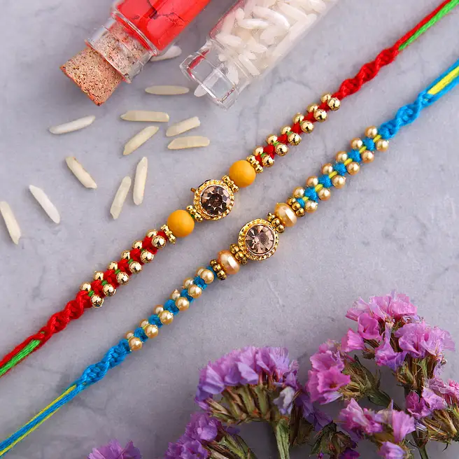 Buy/Send Set of 2 American Diamond Rakhi Online- FNP