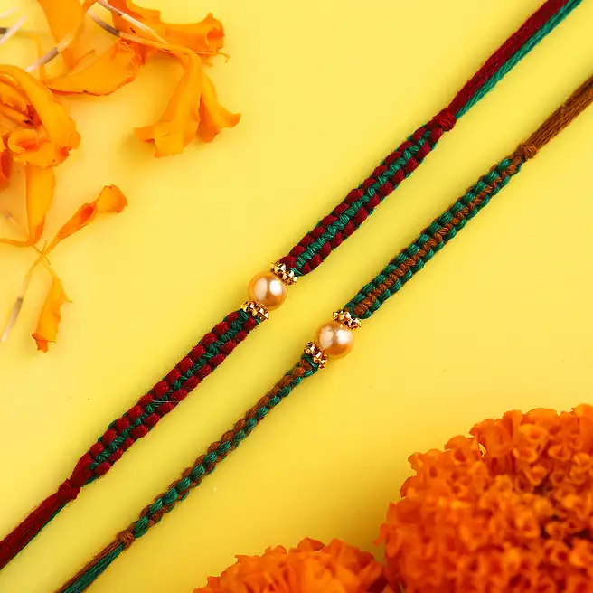 Buy/Send Set of 2 Pearl Sleek Rakhi Online- FNP