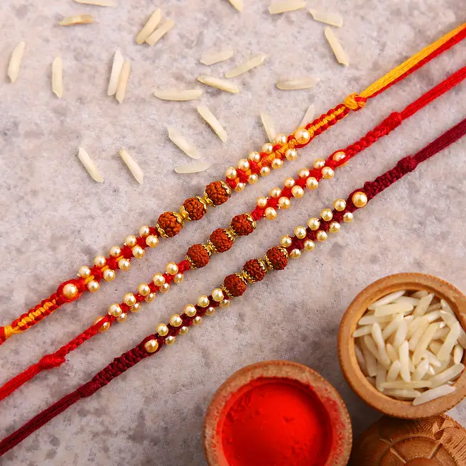 Buy/Send Set of 3 Sleek Rudraksha Rakhi Online- FNP
