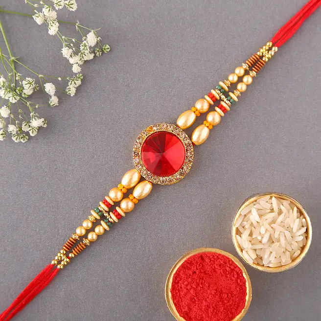 Buy/Send Sneh Red American Diamond Rakhi Online- FNP