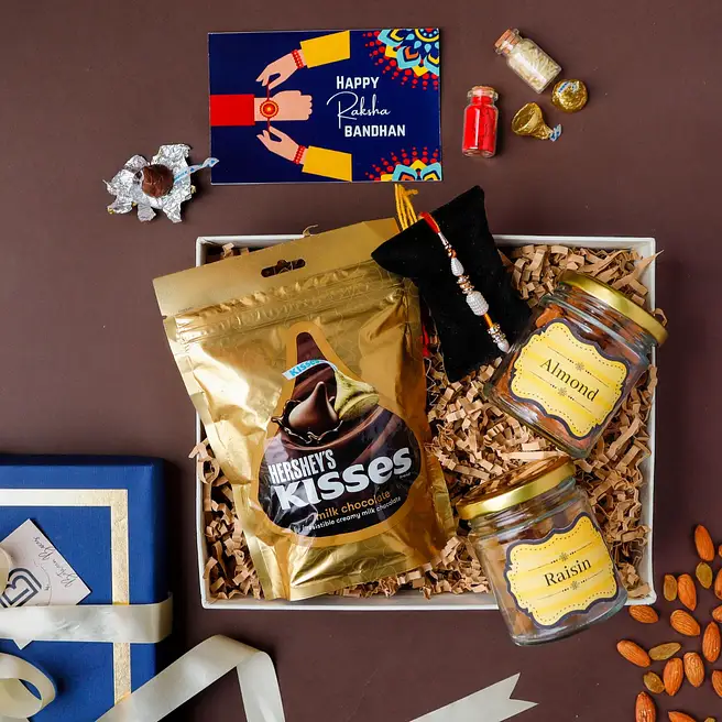 Buy/Send Pearl Rakhi N Sweet Gift Hamper Online- FNP