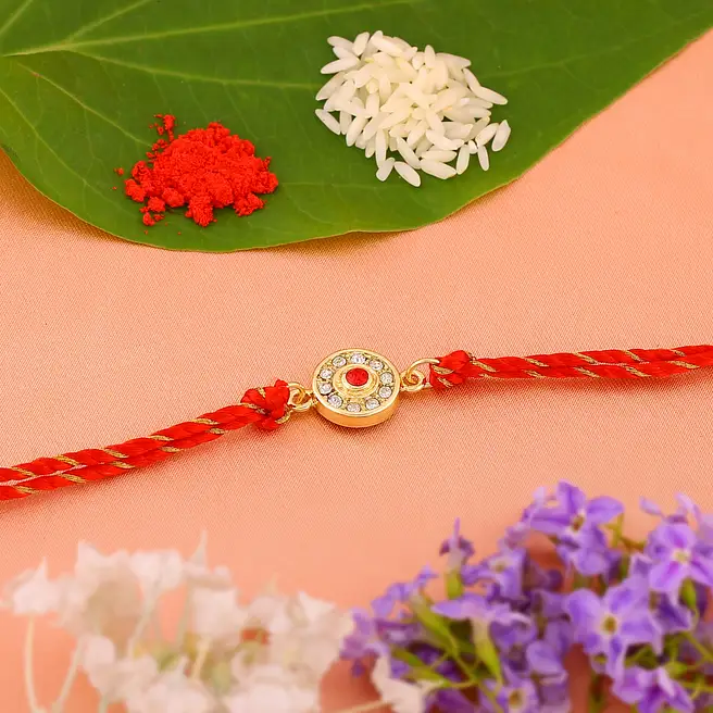 Buy/Send Gold Plated Classic Round Dial Rakhi Online- FNP