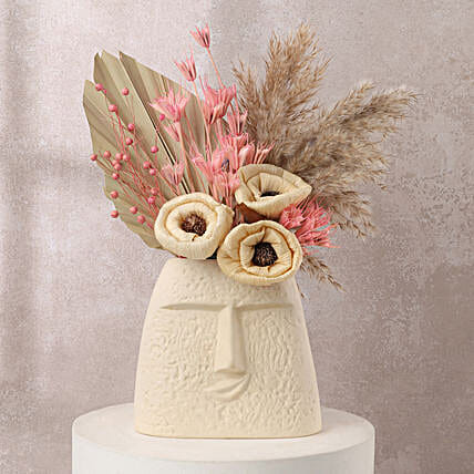 Face Vase with Dried Flowers