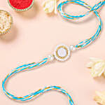 Elegant Pearl Charm Rakhi