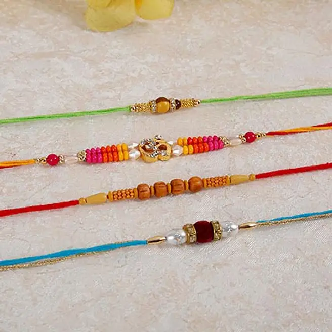 Formal Rakhi Set Of 4 Elegant Rakhi usa | Gift Set Of 4 Elegant Rakhi- FNP