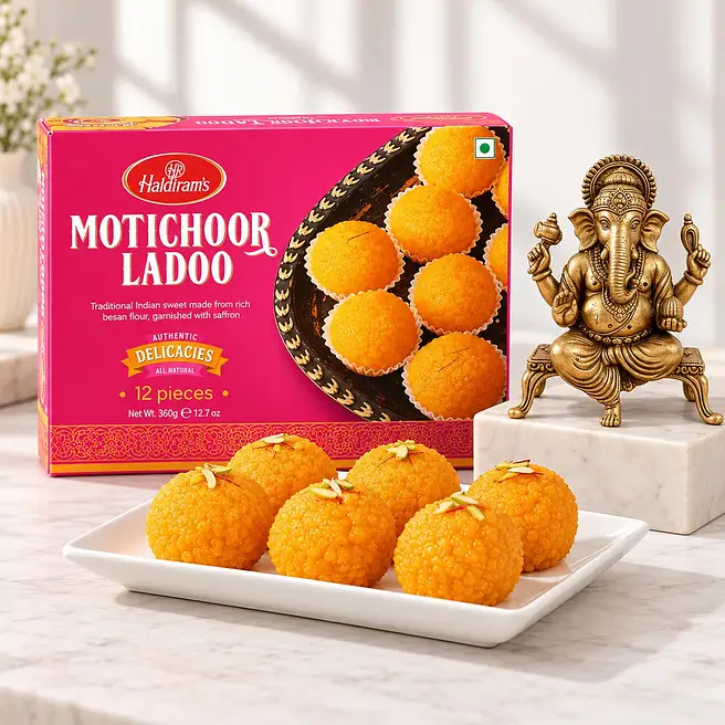 Ganesha on Chowki with Festive Laddoo